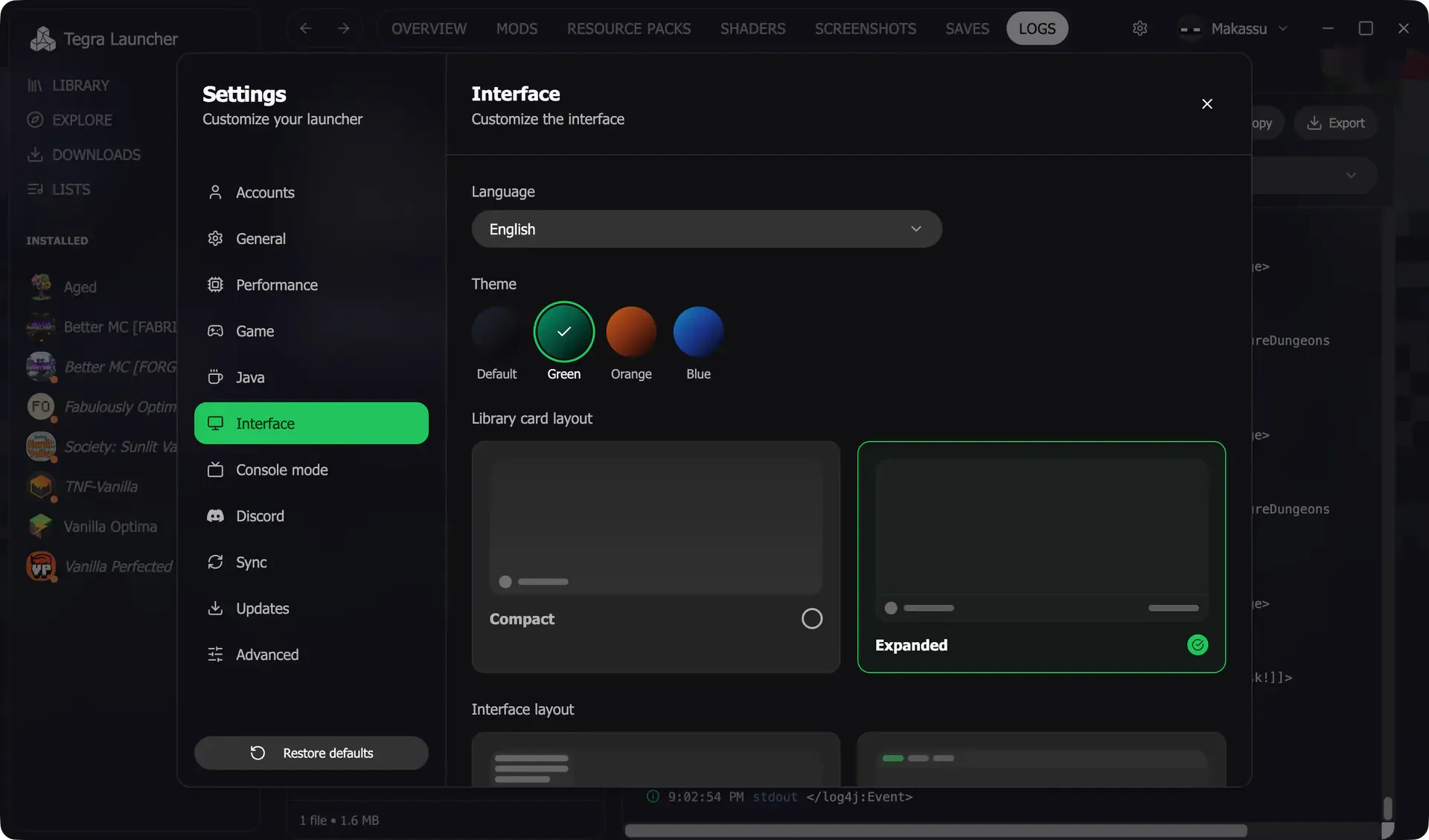 Configurações de Interface com opções de idioma, tema e formato dos cartões da Biblioteca